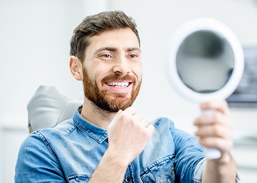 Man with flawless smile after cosmetic dentistry