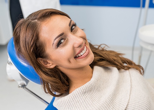 Woman smiling during cosmetic dentistry consultation