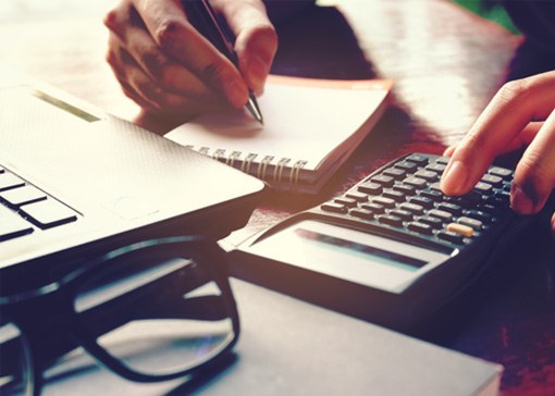 Woman using a calculator