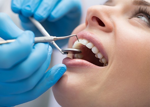 Patient receiving scaling and root planing periodontal treatment