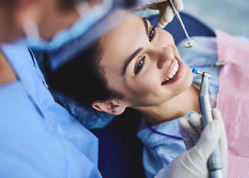 Woman receiving dental checkup during preventive dentistry visit