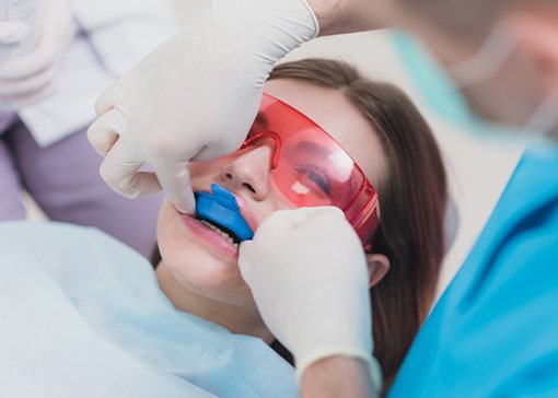 Patient receiving fluoride treatment