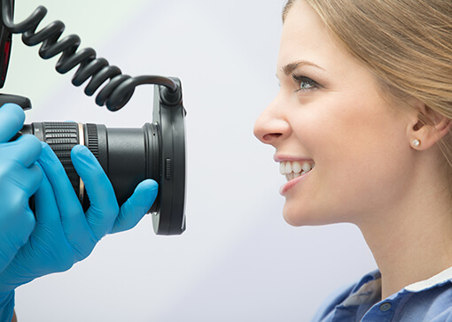 Dentist capturing intraoral images