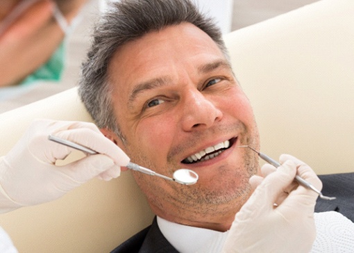 dentist creating a dental bridge
