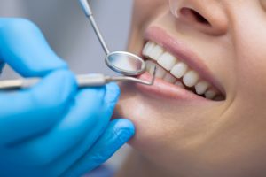 Woman not skipping a dental cleaning in North Andover.