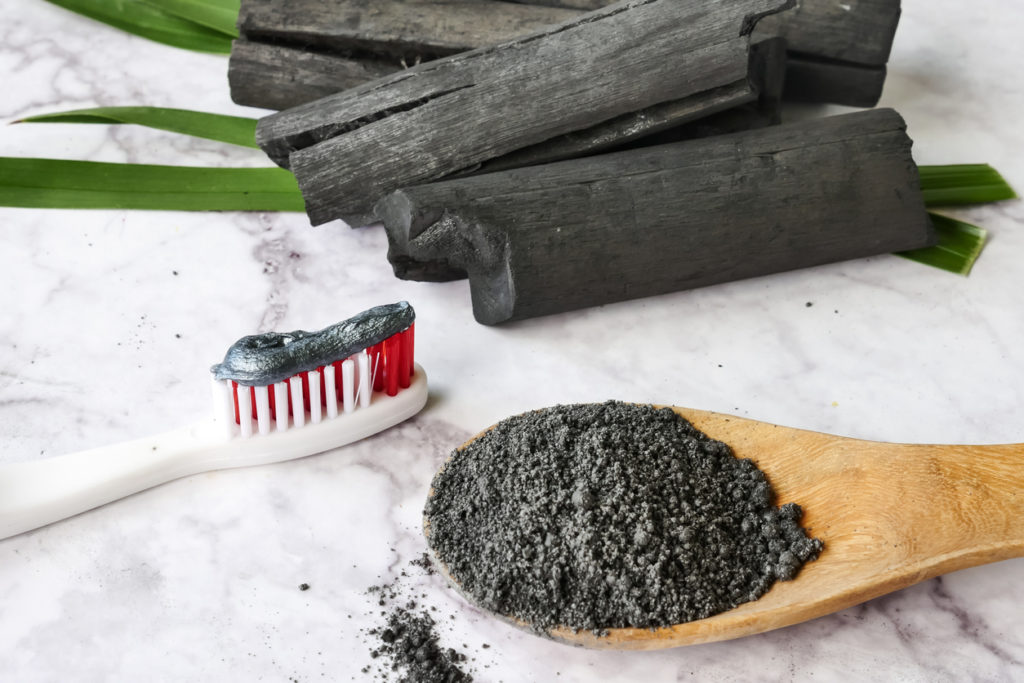 activated charcoal toothpaste on toothbrush